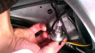 How to replace a Mercedes Benz headlight bulb [upl. by Aivatnwahs]