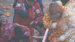 Battle of the Oranges Italians pelt each other with fruit in Ivrea [upl. by Gualterio]