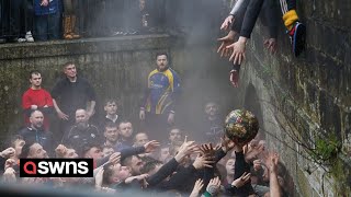 Royal Shrovetide Football in Ashbourne Derbyshire  SWNS [upl. by Adnoval]