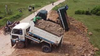 Ep11 New project landfill Skill operator pushing soil into water with 5ton trucks unloading soil [upl. by Sadonia]