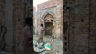 After the arch design is made the bricks are being removed to be plastered [upl. by Ahsini]