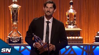 Connor Hellebuyck Takes Home The 202324 Vezina Trophy [upl. by Anatnas]