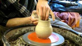 Making throwing a simple flattened clay pottery salt holder on the wheel [upl. by Karena]