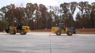 CAT 938K vs Deere 624K [upl. by Ahseei]