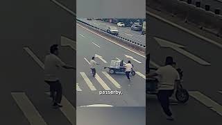 Man Risks Life to Stop ThreeWheeler and Save Child [upl. by Anerak843]