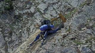 Spider Excavator on Extreme Slope Digging Footings [upl. by Anitnerolf]