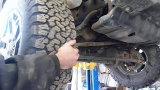 Steering Stop Adjustment to Fit Larger Tires on a Jeep Wrangler [upl. by Legnaros539]