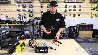 How to Use a Digital Multimeter Checking Voltage  Car Audio 101 [upl. by Kila57]