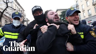 Georgia police clash with protesters denouncing disputed election result [upl. by Ailed]