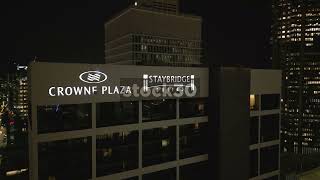 Night Time Drone Shot Of Crowne Plaza And Staybridge Suites Building Atlanta Georgia USA [upl. by Gerianne]