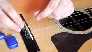 How to Change an Acoustic Guitar String EASY [upl. by Oiratno955]