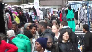 Standing at Petticoat Lane Sunday Market Gherkin Building in background  4th December 2011 [upl. by Ainsley]