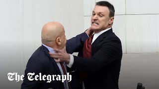 Mass brawl in Turkish parliament as proErdogan MPs trade blows with opposition [upl. by Mavra]