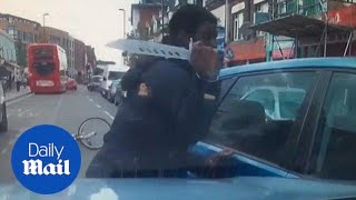 Shocking moment cyclist pulls knife on driver in fit of road rage [upl. by Rosemari949]