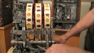 How to Unjam a Mills Antique Slot Machine Part 2 of 2 produced by Coin Op Preservation Society [upl. by Aitnohs]