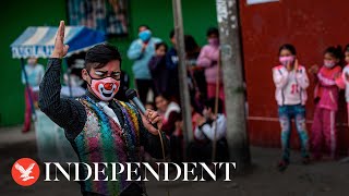 Live Clowns parade through Limas streets for Peruvian Clown Day [upl. by Luhey298]