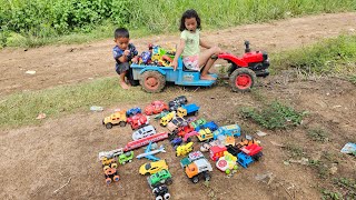 Yana Oun Mey rides a tractor looking for a lot of small cars today [upl. by Swithbart]