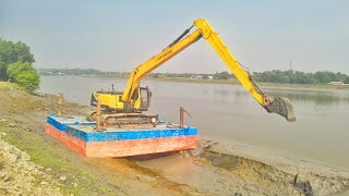 on pontoon Long Reach Excavator Digging The River HYUNDAI 245LR SMART [upl. by Annaul]