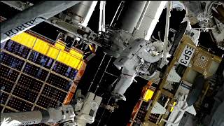 Spacewalkers install rollout solar array outside space station [upl. by Nannah]