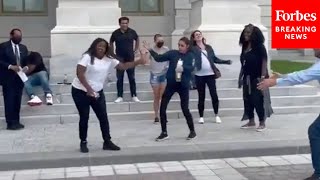 Viral Moment AOC And Cori Bush Dance Outside Capitol During Eviction Moratorium Protest [upl. by La985]