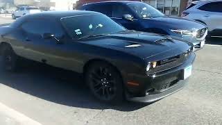 This Dodge Challenger RT is slightly debadged and has a aftermarket hood [upl. by Nymzaj]