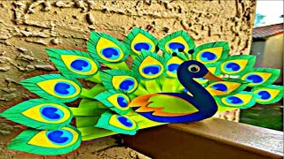 how to make a paper peacock  كيفية صنع طاووس من الورق [upl. by Ynavoj470]