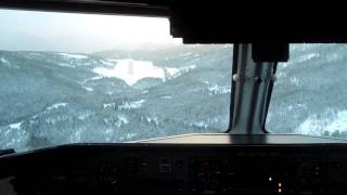 Dash 8 landing in Sogndal Norway  cockpit view [upl. by Aldous978]