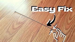 EASY DIY How to QUICKLY Fix a Crack in a Laminate Floor [upl. by Tiraj59]