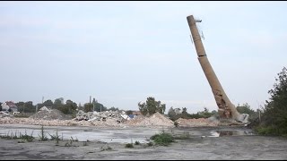 Perfekt sprængning af 35 meter høj skorsten i Slagelse [upl. by Bobseine709]