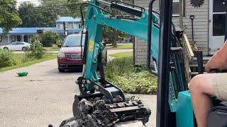 Chinese mini excavator loading suv on trailer [upl. by Ennove]