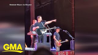 Country singer Scotty McCreery stops show after seeing man hit woman in crowd [upl. by Nalyak]