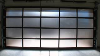 New American Home 2014  Clopay Avante Collection Glass Garage Doors [upl. by Enahsed]