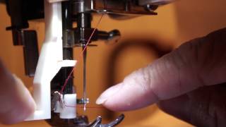 HOW TO USE THE AUTOMATIC NEEDLE THREADER ON A SINGER SEWING MACHINE 4166 tutorial [upl. by Mahseh]