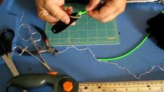 Slingshots tying leather to surgical tubing [upl. by Dranoel876]