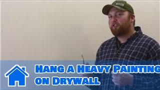 All About Walls  How to Hang a Heavy Painting on Drywall [upl. by Ellehcam]