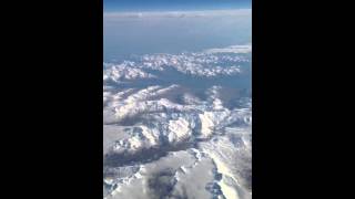 Flying over Alaskas Aleutian islands [upl. by Ellerrad119]