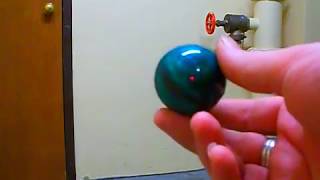 WhamO Superball vs 50¢ Rubber Ball [upl. by Ahsinal]