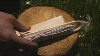 Ray Mears  How to carve a needle and gauge for net making Northern WIlderness [upl. by Aniloj]