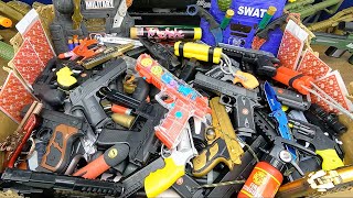 Toy Guns Box Police Pistols Weapons amp Equipment Box of Toy BB Guns Collection Bomb Bullets [upl. by Nnylrebma]