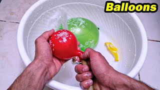 Pop Colorful Water Balloons  Popping Balloon Slow Motion [upl. by Nesyt]