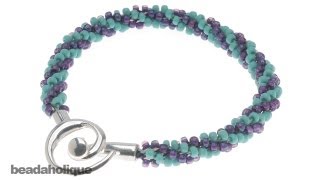 How to Braid Beaded Kumihimo and Make a Bracelet [upl. by Miarfe]