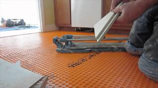 Diagonal tile floor replaced with new tile on Schluter Ditra Part 3 Lay out marking and cutting ti [upl. by Aekal404]