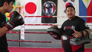 KRU Muay Thai Tip of the Week  Basic Thai Pad Holding Pt 1 [upl. by Walsh861]