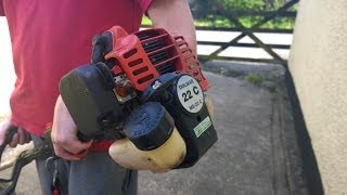 How to Install Strimmer Wire  Dolmar [upl. by Yorle]