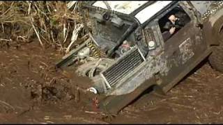 Land Rover Defender 46 V8 in bomb hole [upl. by Burkhart]