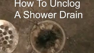 Unclogging a Shower Drain  How to Unclog a Shower Drain [upl. by Novaat723]