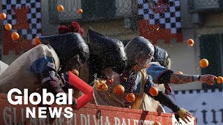 Italians turn out in droves for Battle of the Oranges festival [upl. by Ridglee122]