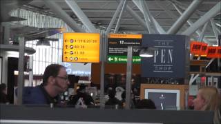 London Stansted Airport departures waiting area restaurants and shops [upl. by Oreves]