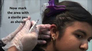 ear piercing with gun  live ear piercing  gunshot painless ear piercing  ear piercing  painless [upl. by Ellennahs]