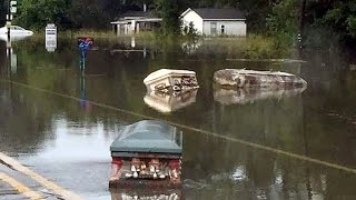 Eerie Coffins Seen Floating Through Flooded Louisiana Streets [upl. by Avevoneg]